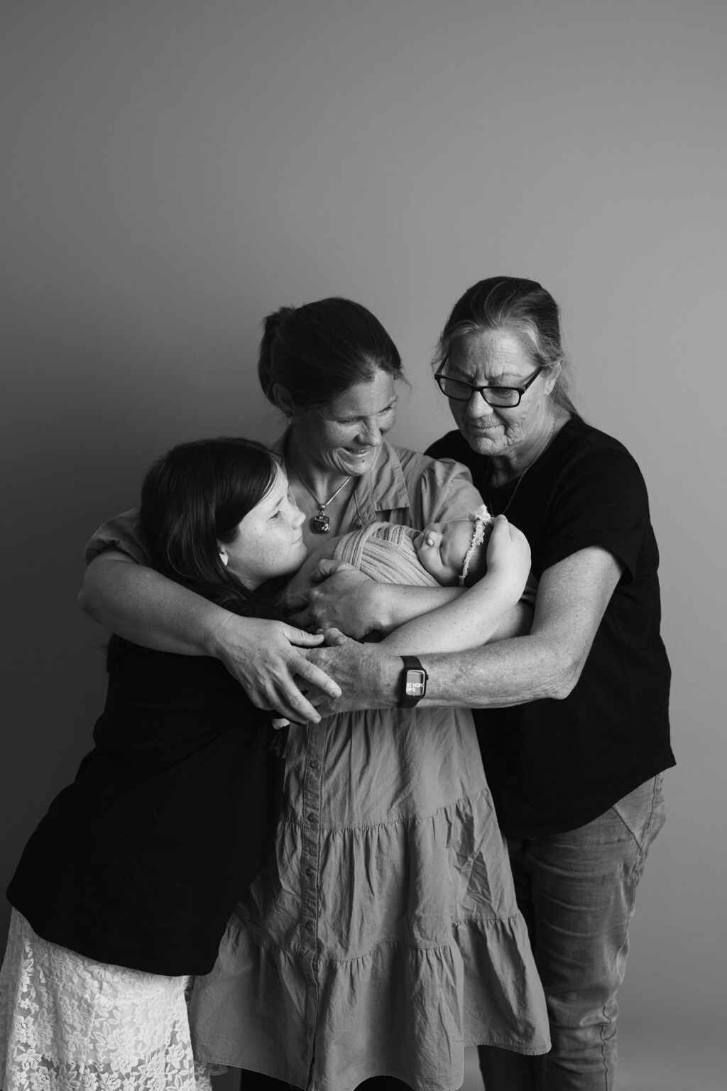 Fay, Lauren, Audrey and baby Eloise together in a family portrait